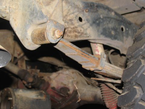 1978 Ford Bronco - Undercarriage view showing the rear leaf spring suspension and axle components.