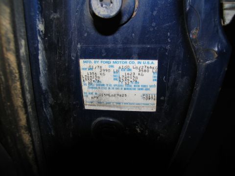 1978 Ford Bronco - A close-up of a vehicle's VIN plate, indicating a manufacturing date of January 1978.