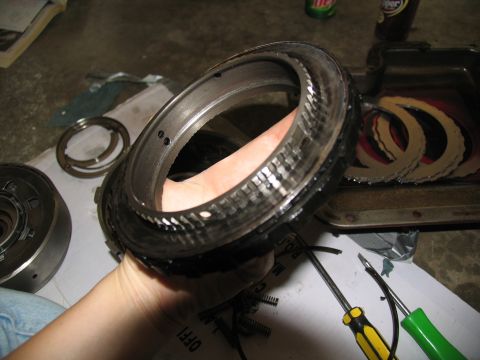 1978 Ford Bronco - Worn transmission drum and clutch plates are shown, indicating a need for repair or rebuild.