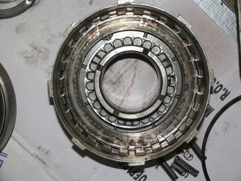 1978 Ford Bronco - A transmission clutch pack shows signs of wear and tear, indicating a need for rebuild.