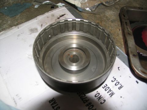 1978 Ford Bronco - Close-up of a transmission drum, likely part of a rebuild process.