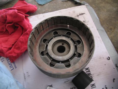 1978 Ford Bronco - Close-up of a transmission clutch drum, possibly for rebuild. Text on paper reads 'MADE IN TAIWAN'.