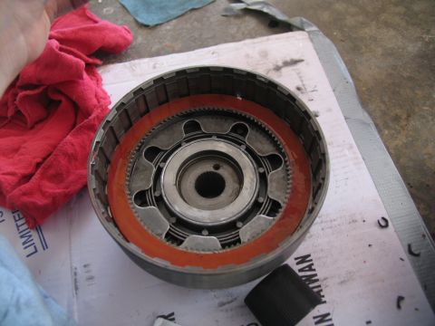1978 Ford Bronco - A transmission clutch pack is shown, possibly during a rebuild or repair process.