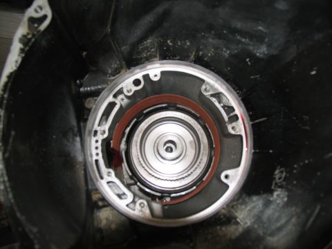 1978 Ford Bronco - Close-up view of a transmission torque converter, showing internal components and a red gasket.