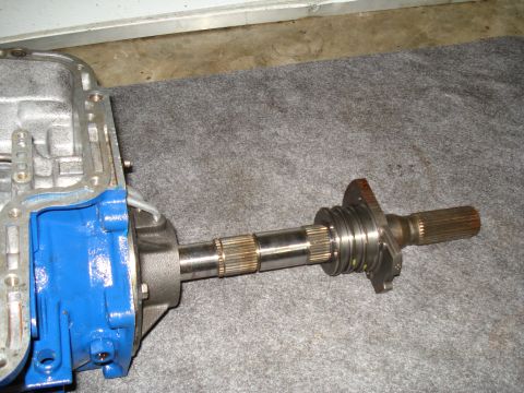 1984 Ford Bronco - A close-up view of a transmission output shaft and housing, likely for a vehicle rebuild.