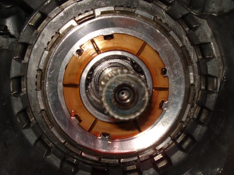 1984 Ford Bronco - Internal view of a transmission clutch pack, showing wear on the friction material.