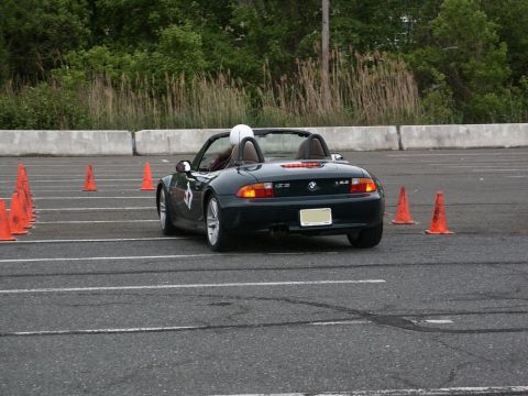 2001 Mercury Grand Marquis - A BMW Z3 M Roadster is seen on a paved lot during what appears to be an autocross event.