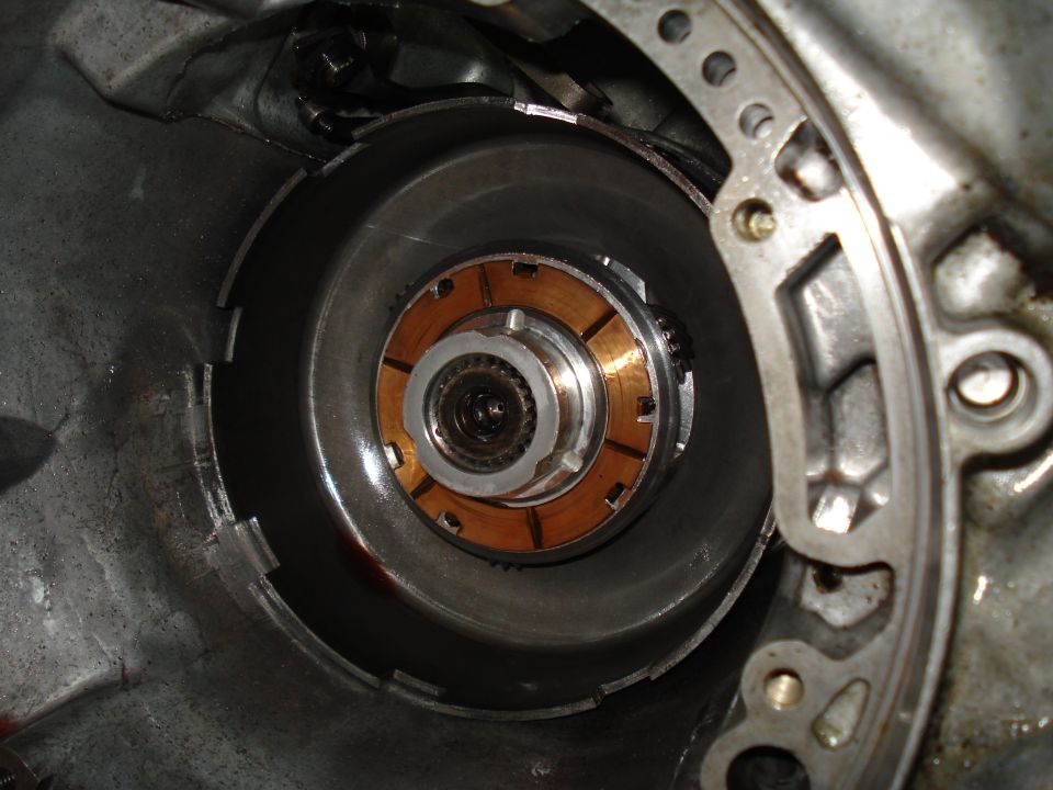 Transmission torque converter with copper clutch plates