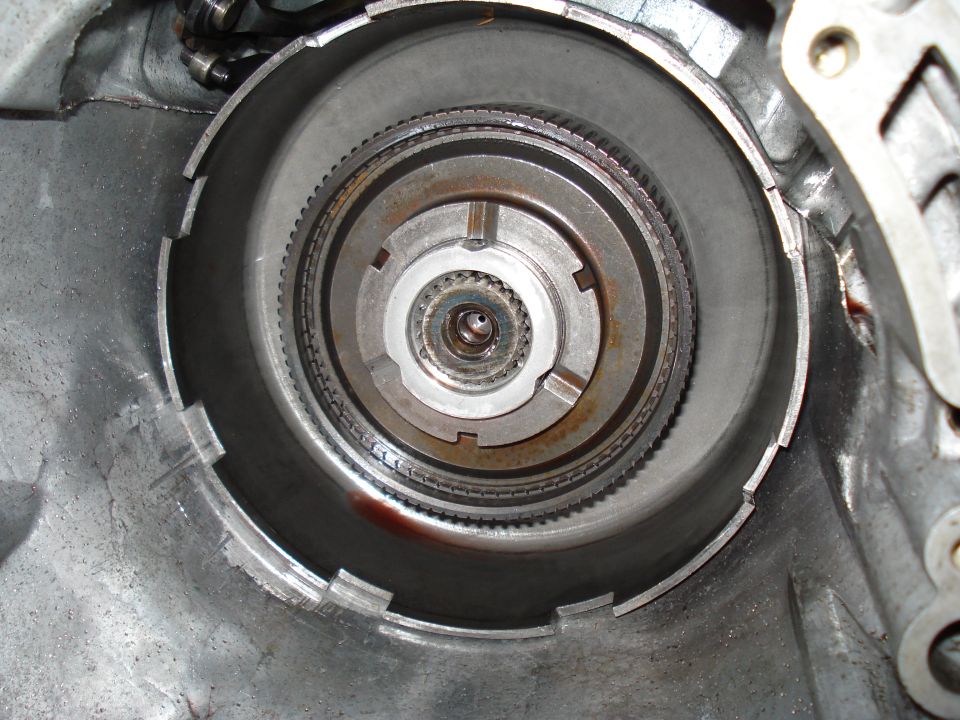 Close-up of automatic transmission internals, showing gears and clutch pack components
