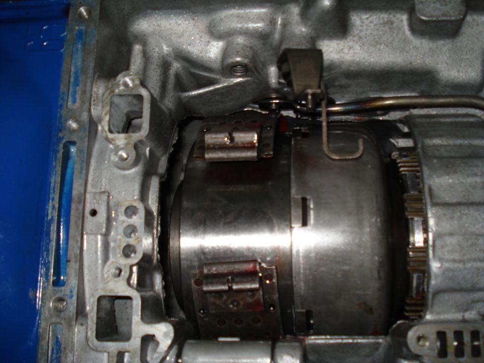 Automatic transmission torque converter with internal clutch pack visible