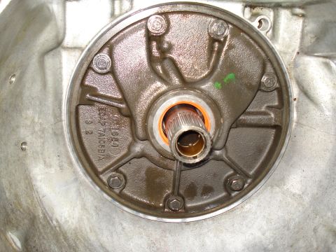 1984 Ford Bronco - Close-up of a transmission oil pump assembly, with visible stamping indicating the year 1984.