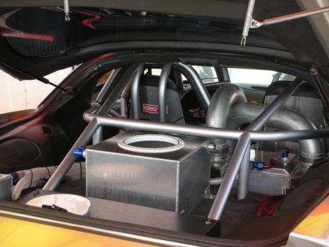 1998 Ford Crown Victoria - Customized race car interior with extensive roll cage and fuel system modifications.