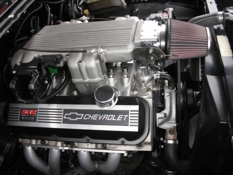 1998 Ford Crown Victoria - Close-up of a Chevrolet 502 big block engine, showing intake manifold and air filter.