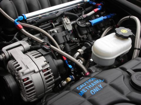 1998 Ford Crown Victoria - Custom engine bay modifications include braided fuel lines and a clear warning about methanol use.