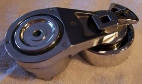 2002 Ford Mustang - A close-up view of a metal belt tensioner assembly, showing the part number S8188.
