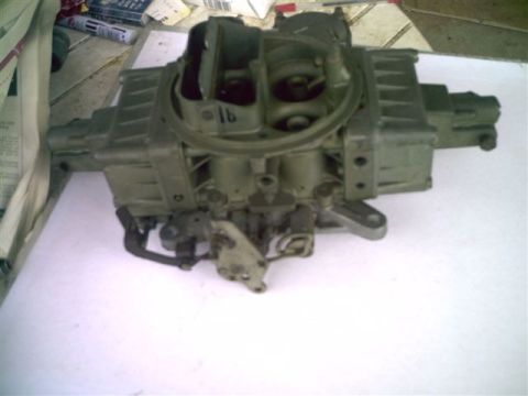 1964 Ford 427 - This is a Holley carburetor, likely a performance part, shown from the front.