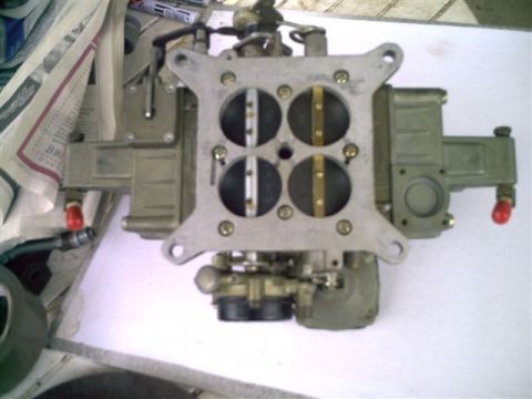 1964 Ford 427 - Close-up of a Holley carburetor, a critical engine component for fuel delivery.