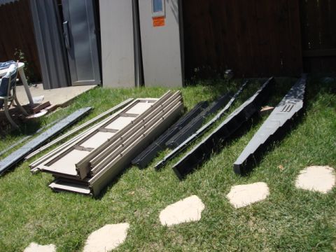 1983 Ford Bronco - this is all the other parts to the shed.i spread them out over the back lawn.