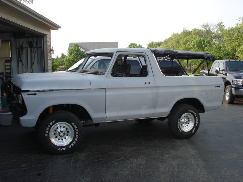 1979 Ford Bronco - This Ford Bronco appears to be undergoing restoration, with a primer coat and an aftermarket roll cage installed.