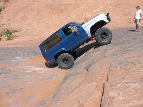 1997 Ford Ranger - Ford Bronco navigating difficult terrain off-road.