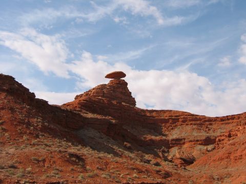 1997 Ford Ranger - A unique rock formation in a desert landscape, a flat stone precariously balanced on a spire.