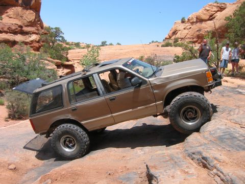 1997 Ford Ranger - This modified Ford Explorer navigates a rocky trail with its rear hatch open.