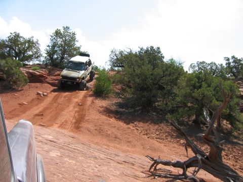 1997 Ford Ranger - Off-roading in Moab, Utah. A 1997 Ford Ranger navigates a challenging dirt incline.