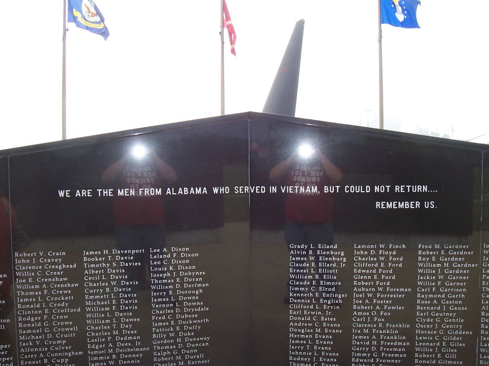 Vietnam Veterans Memorial Wall replica with names and inscription