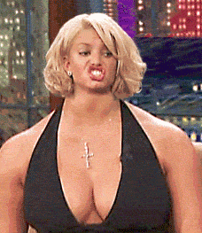 1991 Ford Bronco - Jessica Simpson is shown making a humorous facial expression while wearing a black dress.