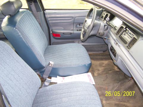 2003 Ford Crown Victoria - The interior of a vehicle shows the front seats and dashboard, with a timestamp from 2007.