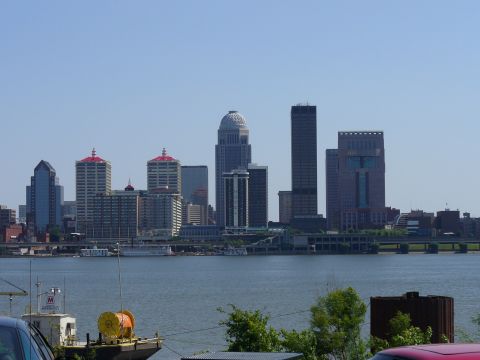 1991 Ford Probe - A view of a city skyline from across a body of water, with several boats visible.