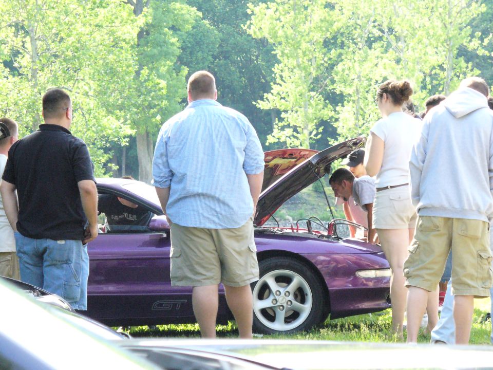 Purple 1991 Ford Probe GT with hood open, side view
