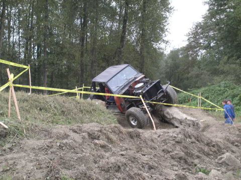 1979 Ford Bronco - This 1979 Ford Bronco navigates a challenging off-road course, with its engine compartment visible.