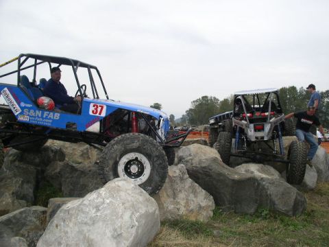 1979 Ford Bronco - Off-road vehicles tackle a challenging rock crawling course.