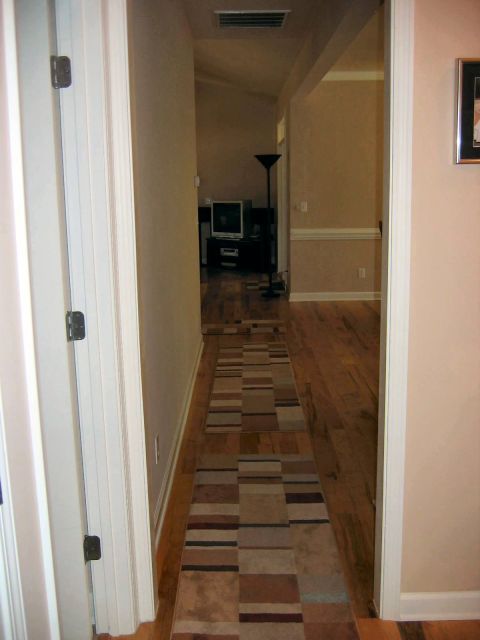 1985 Ford Crown Victoria LTD - At bottom of bonus room stairs, hallway looking towards kitchen and living room.