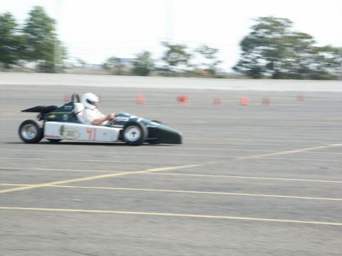 2001 Mercury Grand Marquis - A race car with the number 41 is seen on a track during a race event.