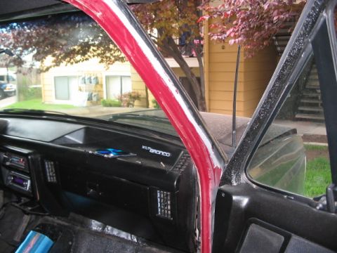 1991 Ford Bronco - Interior view of a 1991 Ford Bronco, highlighting the dashboard and driver's side door.