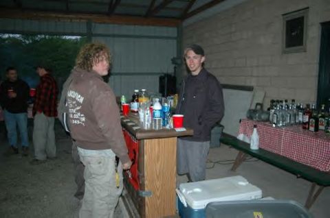 1991 Ford Bronco - Gathering around a bar with drinks and bottles on display.