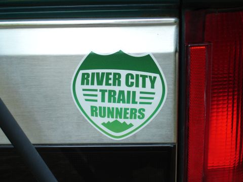 1996 Ford Bronco - Close-up of a 'River City Trail Runners' sticker applied to a vehicle's exterior panel.