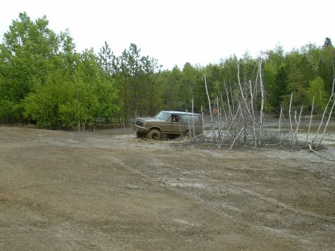1991 Ford Bronco - This 1991 Ford Bronco is stuck deep in the mud during an off-road excursion.