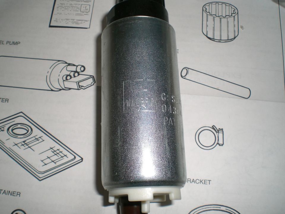 fuel pump with "WALBRO" and "043" visible, resting on a diagram