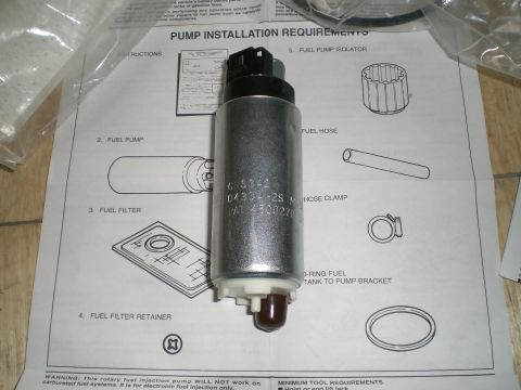 1995 Ford Probe - A fuel pump part is shown with installation instructions and diagrams.