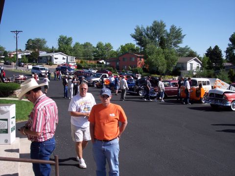 1972 Ford Ranchero - A gathering of vintage automobiles is displayed outdoors on a sunny day.