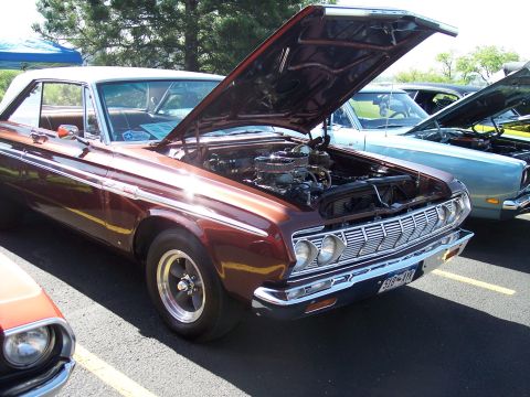 1972 Ford Ranchero - A classic 1972 Ford Ranchero is displayed with its hood open at an outdoor event.