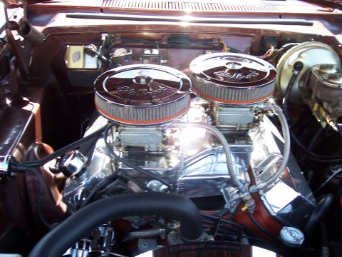 1972 Ford Ranchero - A close-up shot captures the interior of a vehicle, focusing on two occupants.