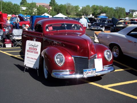1972 Ford Ranchero - Custom built 1939 Mercury Coupe on display at a car show, with other vehicles in the background.