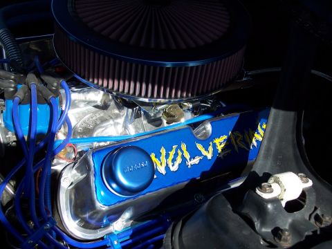 1972 Ford Ranchero - Close-up of a modified engine with a blue valve cover and air filter.