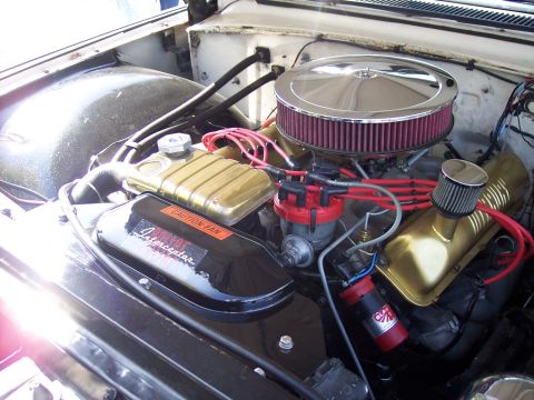 1972 Ford Ranchero - The engine bay features a performance air intake and custom valve covers, with visible 'Interceptor' branding on a fan shroud.
