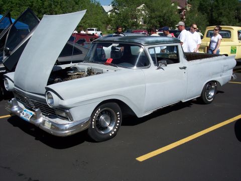 1972 Ford Ranchero - A light gray 1957 Ford Fairlane Ranchero is displayed with its hood up, parked at an outdoor event.