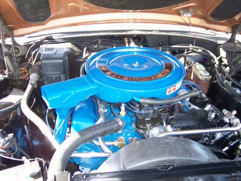 1972 Ford Ranchero - Close-up of an engine bay, a blue air cleaner assembly.